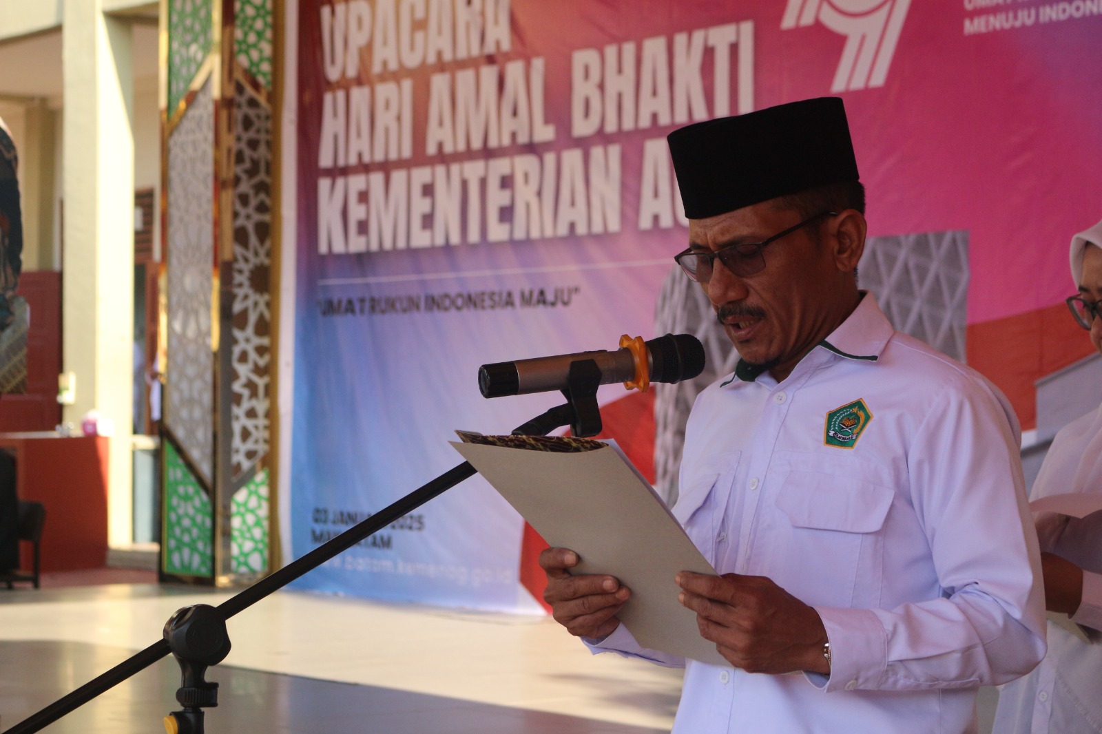 Muhammad Dirham, Kepala Seksi Bimbingan Masyarakat Islam Kemenag Kota Batam, Pimpin Doa pada Peringatan HAB Ke-79 Kemenag RI di MAN 1 Batam